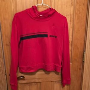 Nike hooded top in size L. Breathable material.